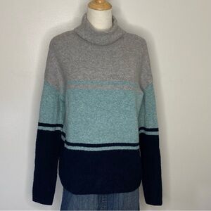 Grey and blue striped turtleneck sweater